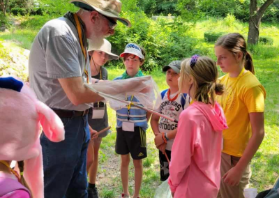 Mark discussing freshly captured insects